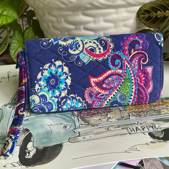 Handbags - Paisley print wristlet   ITEMS $8 or less BOGO . Bundle I will discount.